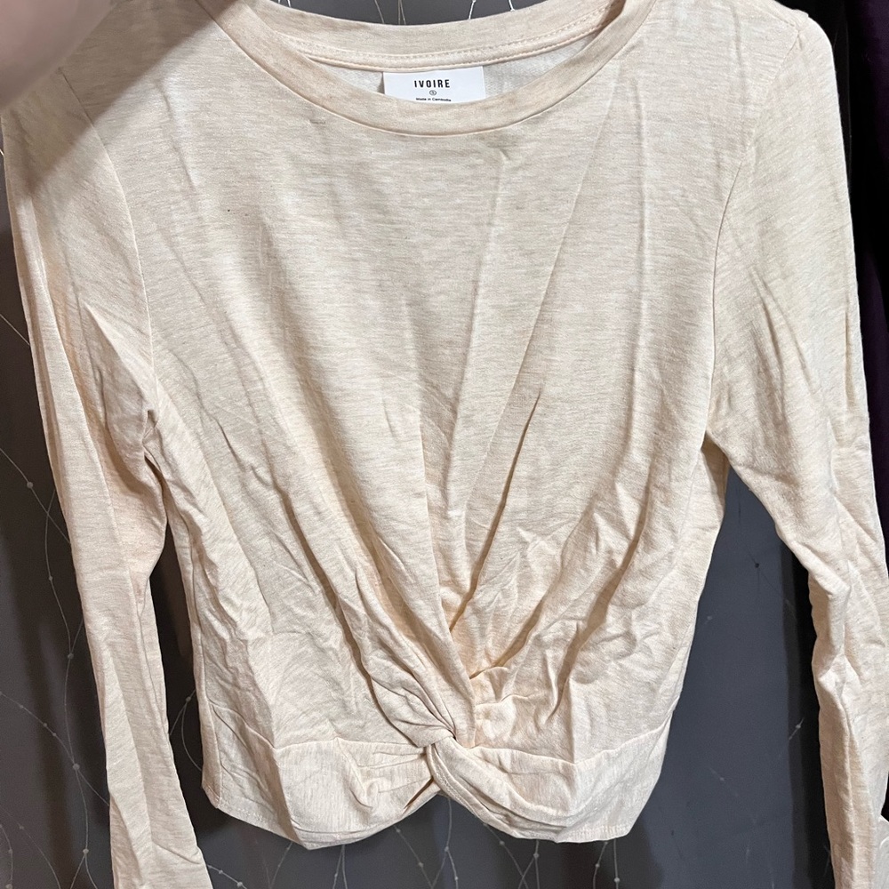 Brand new long sleeve bunched in the front tee